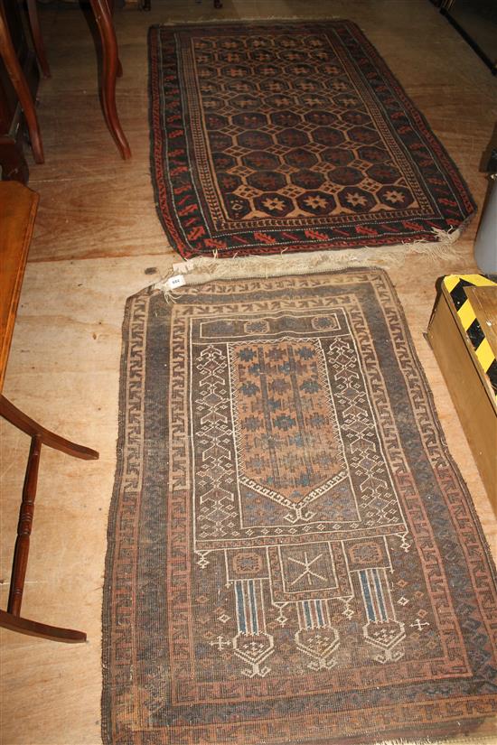 Afghan red ground rug & a prayer rug(-)